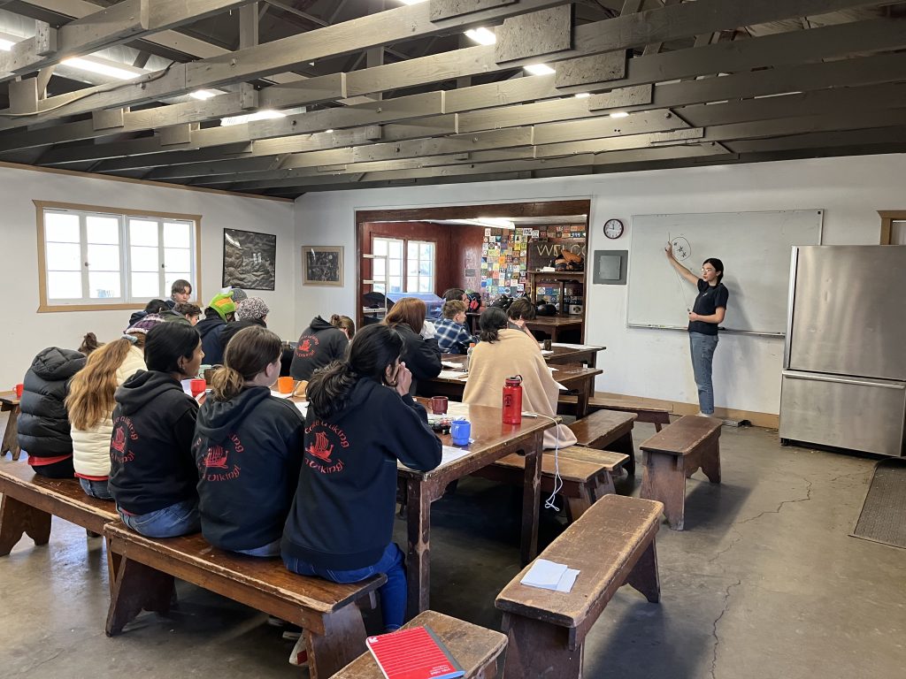 Sea Scouts learning and teaching in a classroom at an advancement weekend